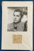 Tyrone Power autograph mounted with 10 x 8 inch photo to an overall size of approx. 14 x 16