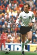 Football World Cup Franz Beckenbauer signed 12 x 8 inch colour Germany action photo. Good Condition.