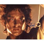 Lord of the Rings 8x10 photo signed by actor Elijah Wood who played Frodo Baggins. Good Condition.