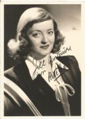 Bette Davis signed 7 x 5 inch b/w vintage photo to Jill. Good Condition. All autographs come with