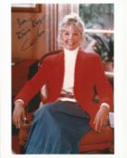 Doris Day signed 10 x 8 inch colour portrait photo. Good Condition. All autographs come with a