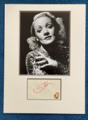 Marline Dietrich autograph mounted with 10 x 8 inch photo to an overall size of approx. 14 x 16