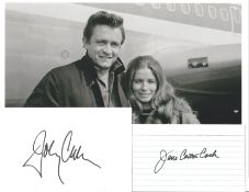 Johnny Cash and June Cash signature piece includes two signed white cards and a fantastic black