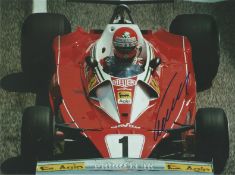 Niki Lauda signed 10x8 colour photo pictured driving for Ferrari in Formula One. Good Condition. All