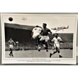 Football, Peter McParland signed 12x18 black and white photograph picturing McParland, playing for