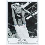 Football. Billy Bonds Signed 16x12 black and white photo with claret and blue around edges of shirt.