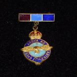 B20 A vintage yellow metal and multi coloured enamel World War Two era RAF "Per Ardua Ad Astra"