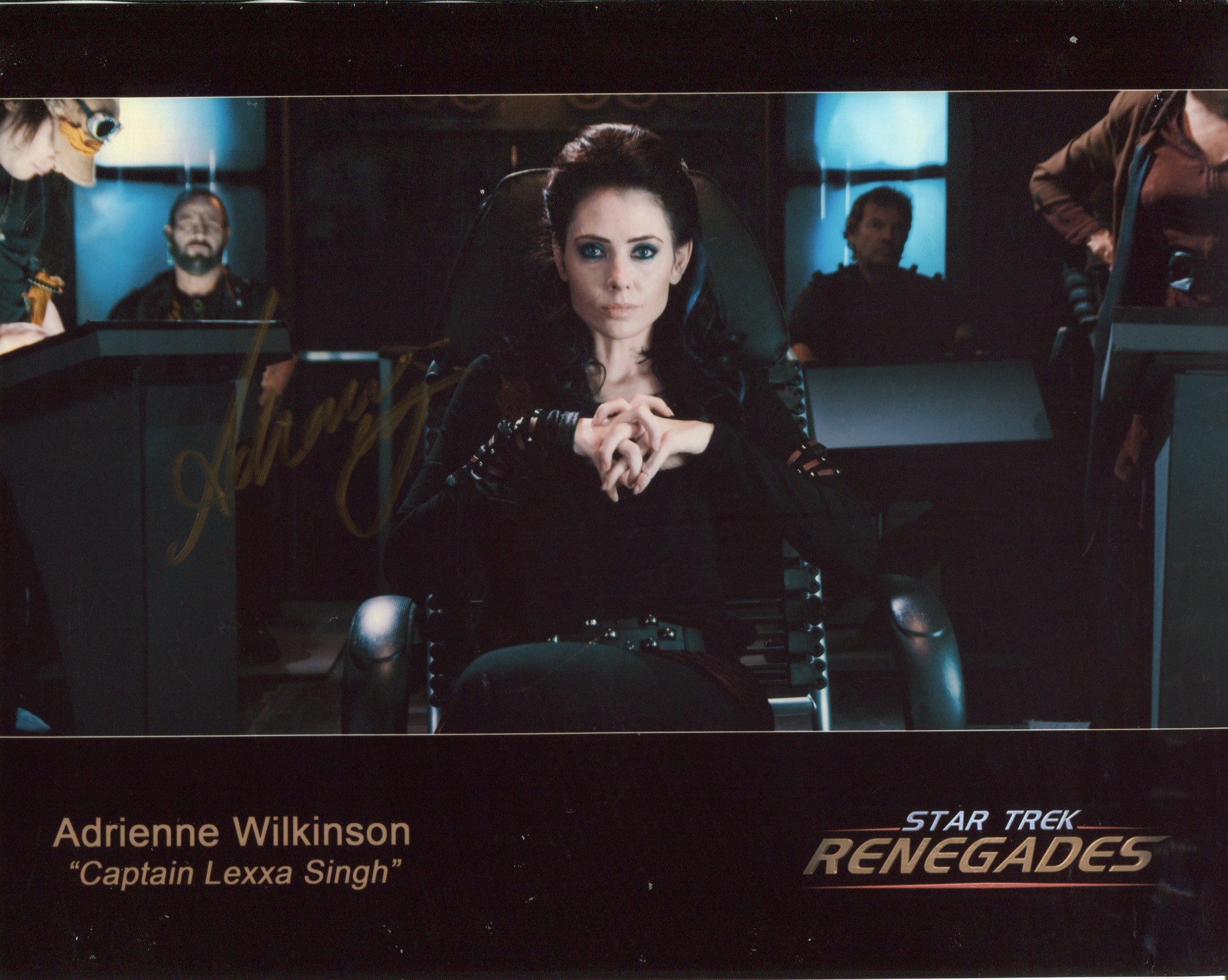 Star Trek 8x10 photo from Star Trek Renegades signed by Adrienne Wilkinson as Captain Lexxa Singh.