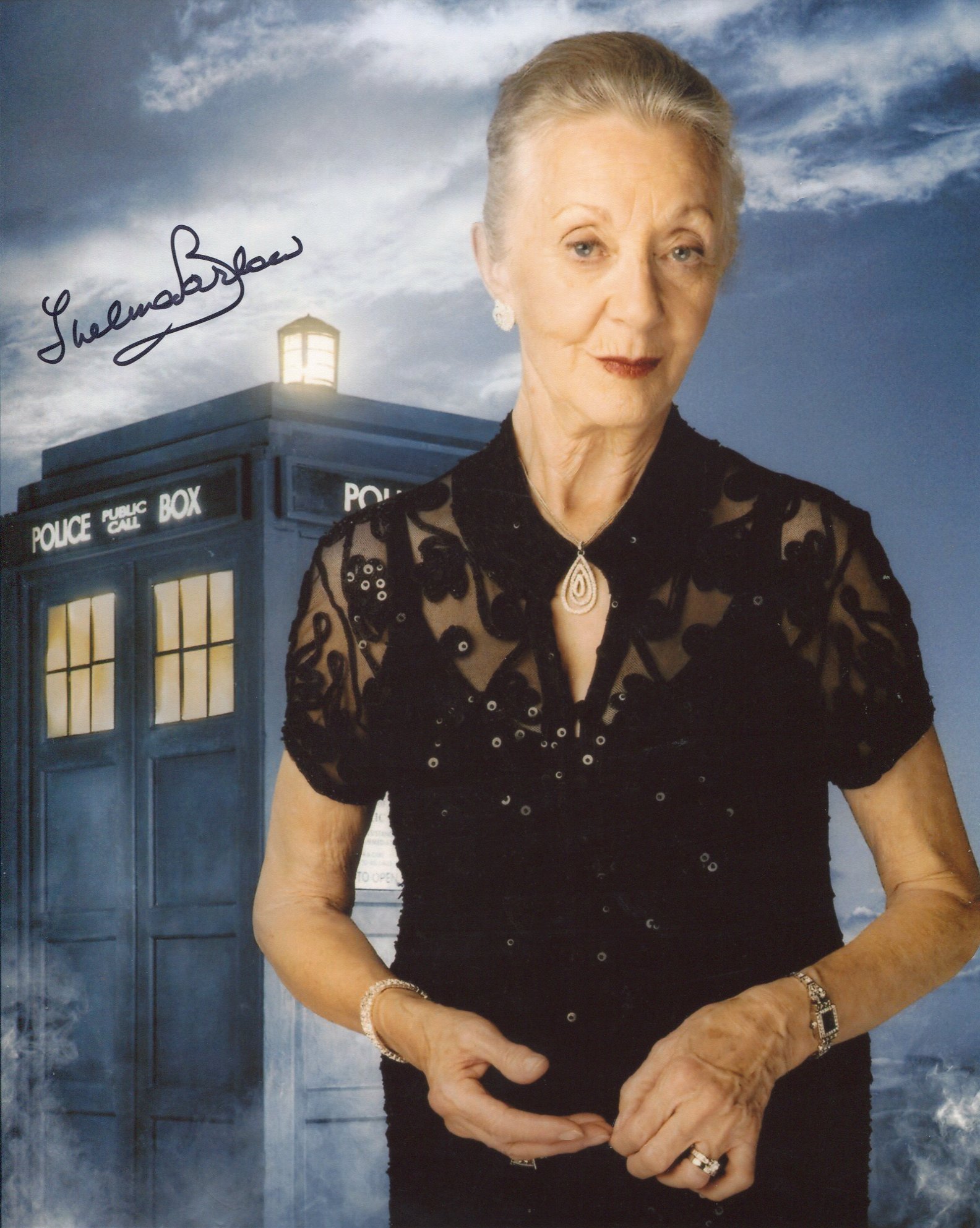 Doctor Who 8x10 Tardis montage photo signed by actress Thelma Barlow. Good condition. All autographs