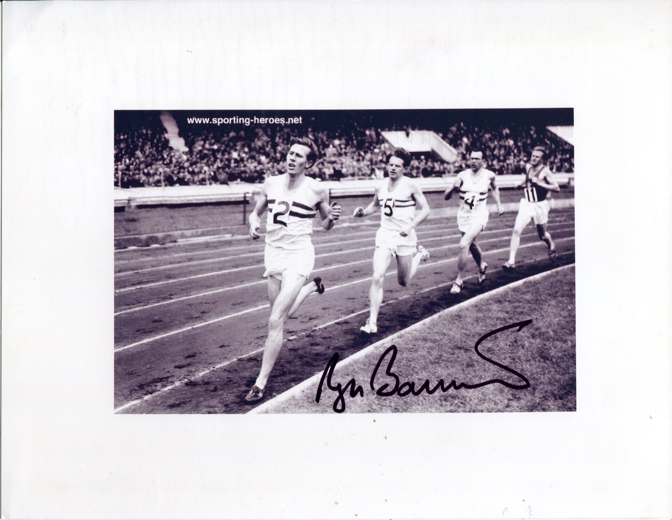 Roger Bannister 8x11 inch photo of the 4 minute mile signed by the late Sir Roger Bannister. Good