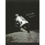 Space signed photo collection. Four colour space magazine photos, two signed by Walt Cunningham