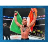 Connor McGregor signed 16x12 colour photo. Irish mixed martial artist, boxer, and businessman. He is