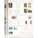 Stanley Gibbons GB Stamp Album with over 100 used GB Stamps, this Album has colour pictures with