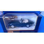 Vintage Toys. Autosalone. Jaguar. A Diecast and plastic pull back action car, with opening doors. In
