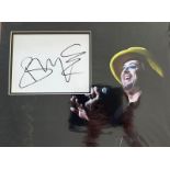Singer, Boy George 16x12 colour presentation photo whilst performing with matted signed card.