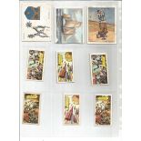Assorted cigarette card collection on 9 pages. 79 cards. Features Gallagher, Brooke bond, Lyons, Joh