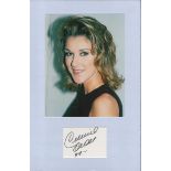 Celine Dion autograph mounted display. A Mounted with photograph to approx. 16 x 12 inches overall.