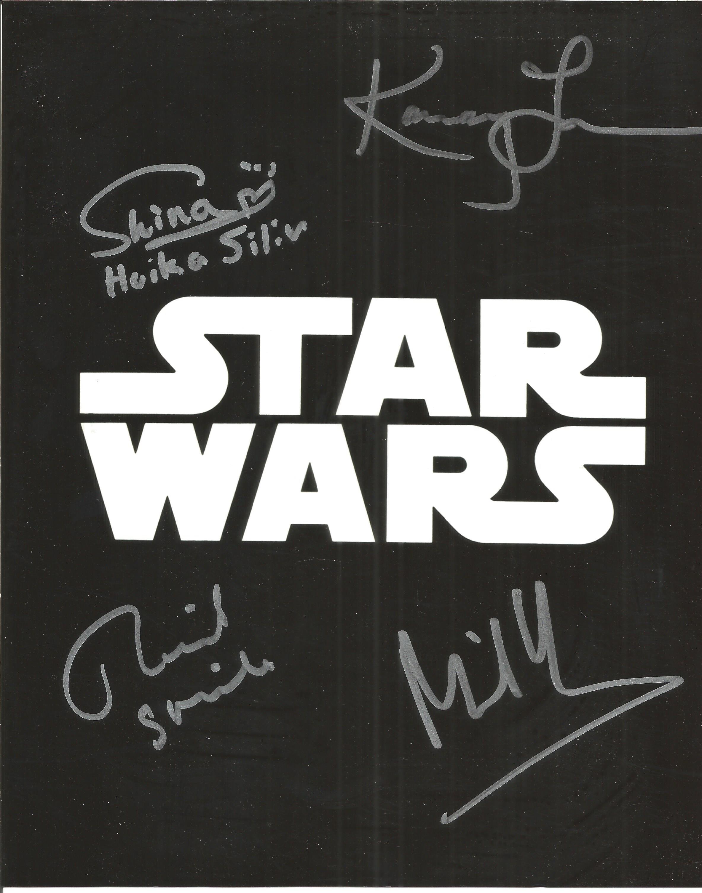 Star Wars photo signed by four actors inc Richard Stride, Kamey Lau, Michael Henbury.