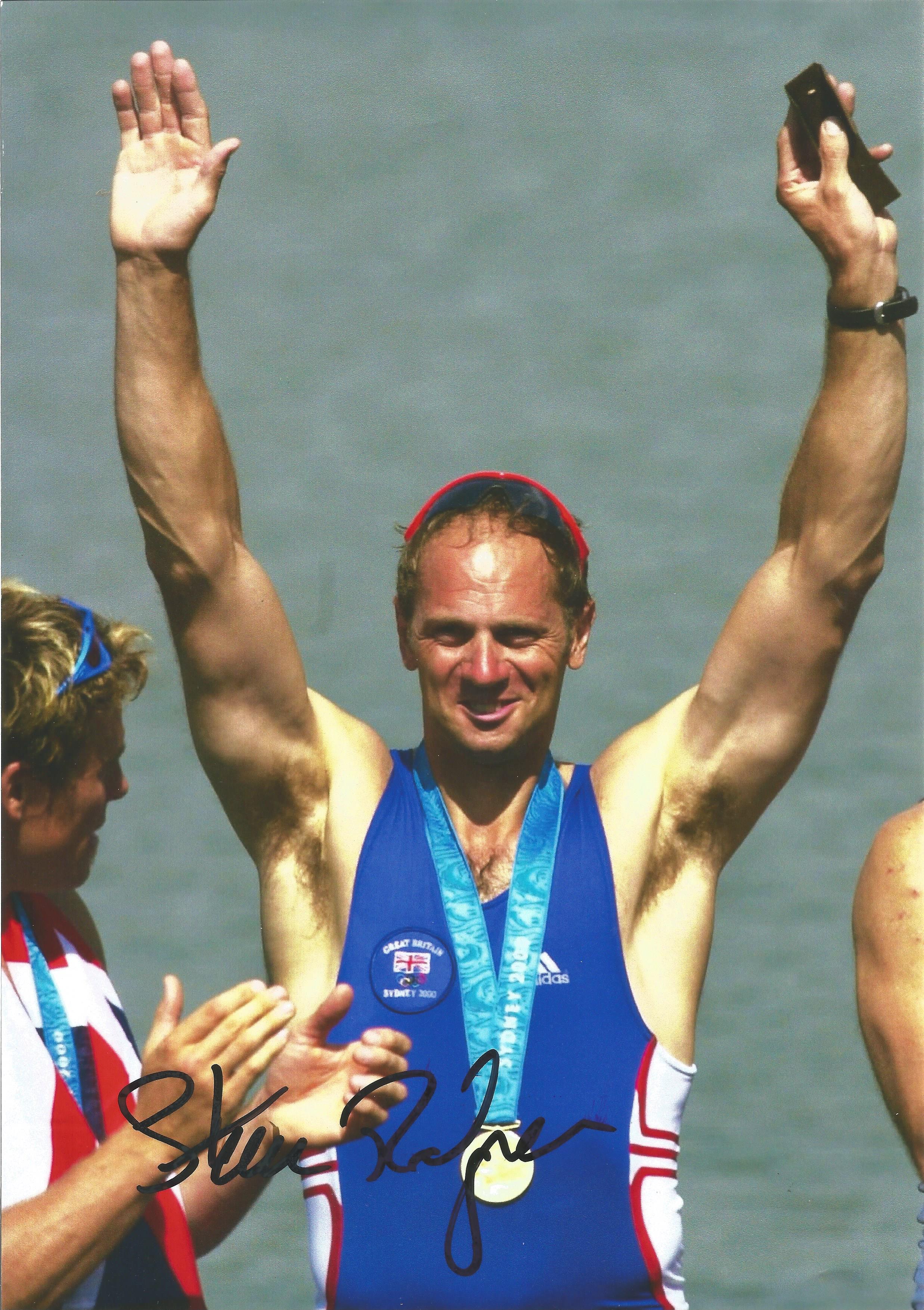 Sir Steve Redgrave signed 10x8 colour photo. Photo Shows Redgrave Celebrating with a Gold Olympic Me