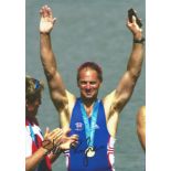 Sir Steve Redgrave signed 10x8 colour photo. Photo Shows Redgrave Celebrating with a Gold Olympic Me