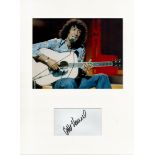 Albert Hammond signature piece autograph presentation. Mounted with unsigned photo to approx. 16 x