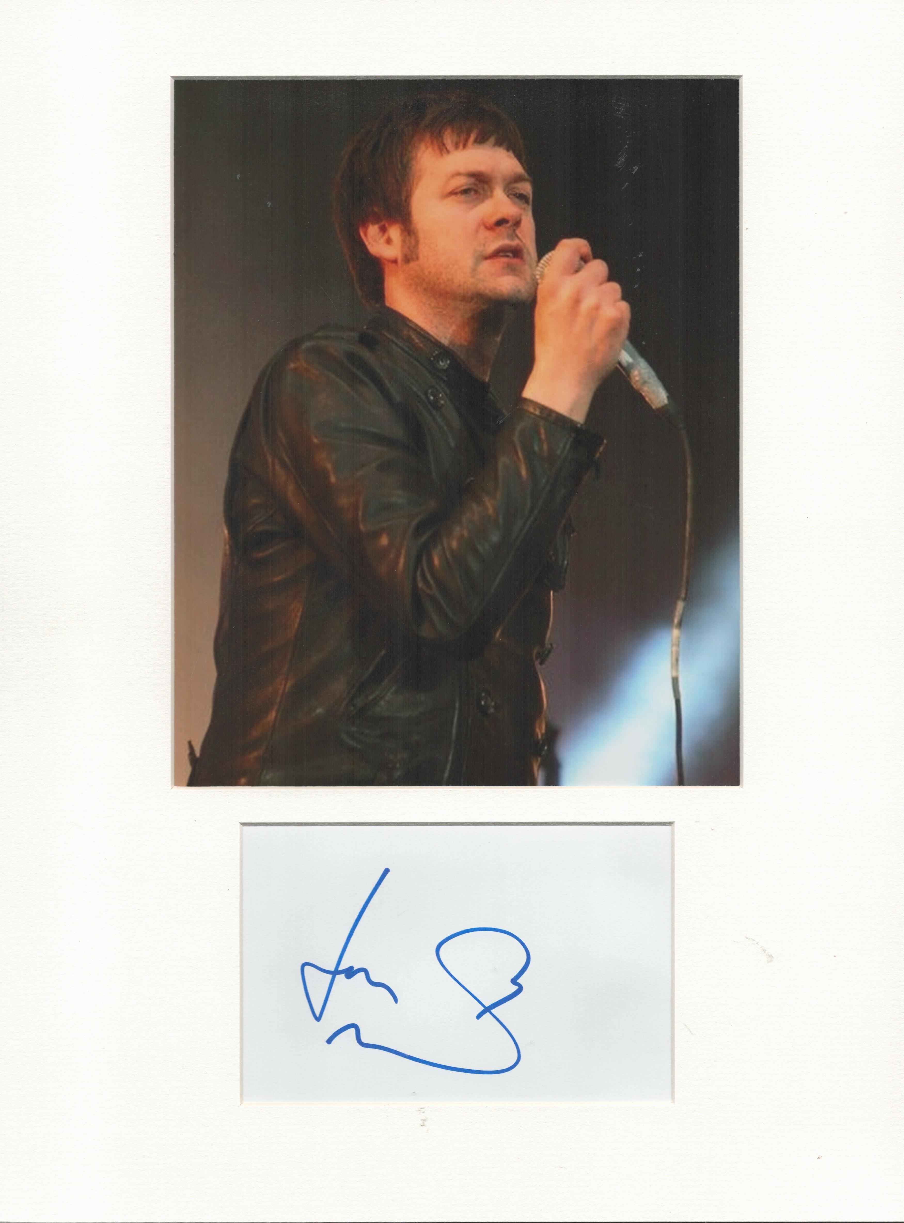 Tom Meighan Kasabian music, signature piece autograph presentation. Mounted with unsigned photo to