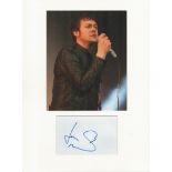 Tom Meighan Kasabian music, signature piece autograph presentation. Mounted with unsigned photo to