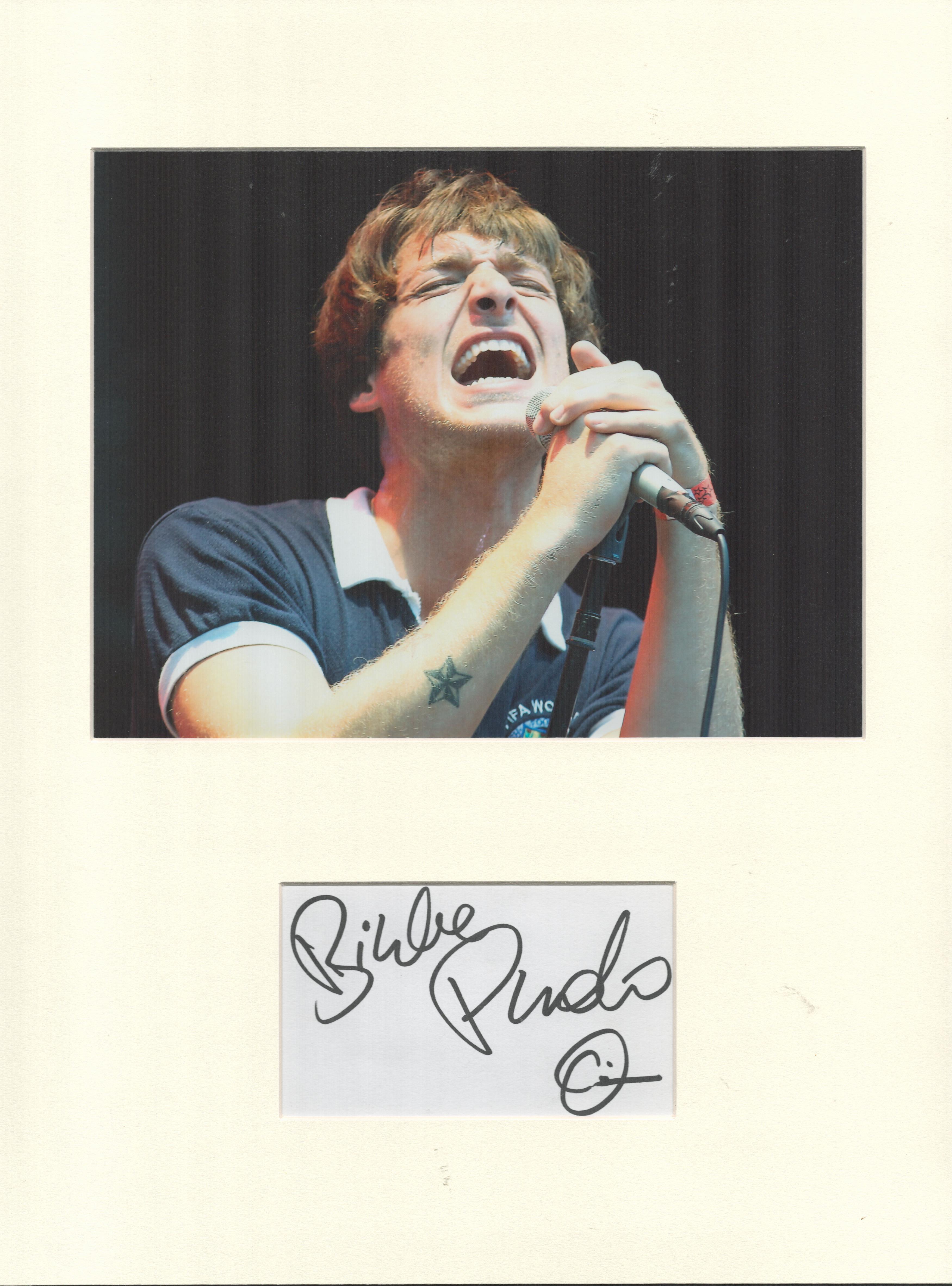Paolo Nutini music, signature piece autograph presentation. Mounted with unsigned photo to approx.