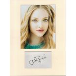 Amanda Seyfried signature piece autograph presentation. Mounted with unsigned photo to approx. 16