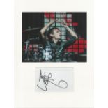 Dominic Howard Muse music, signature piece autograph presentation. Mounted with unsigned photo to