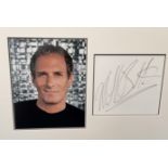 Michael Bolton signature piece autograph presentation. Mounted with unsigned photo to approx. 16 x