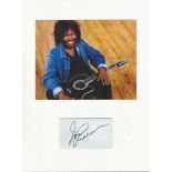 Joan Armatrading music, signature piece autograph presentation. Mounted with unsigned photo to