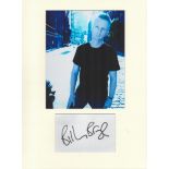 Billy Bragg music, signature piece autograph presentation. Mounted with unsigned photo to approx. 16