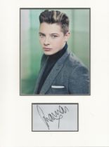 John Newman music, signature piece autograph presentation. Mounted with unsigned photo to approx. 16