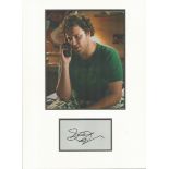 Seth Rogen signature piece autograph presentation. Mounted with unsigned photo to approx. 16 x 12