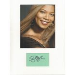 Queen Latifah music signature piece autograph presentation. Mounted with unsigned photo to approx.