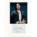 Hozier signature piece autograph presentation. Mounted with unsigned photo to approx. 16 x 12 inches