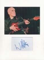 Wilko Johnson music, signature piece autograph presentation. Mounted with unsigned photo to