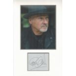 Paul Carrack signature piece autograph presentation. Mounted with unsigned photo to approx. 16 x