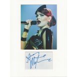 Ana Matronic music, signature piece autograph presentation. Mounted with unsigned photo to approx.