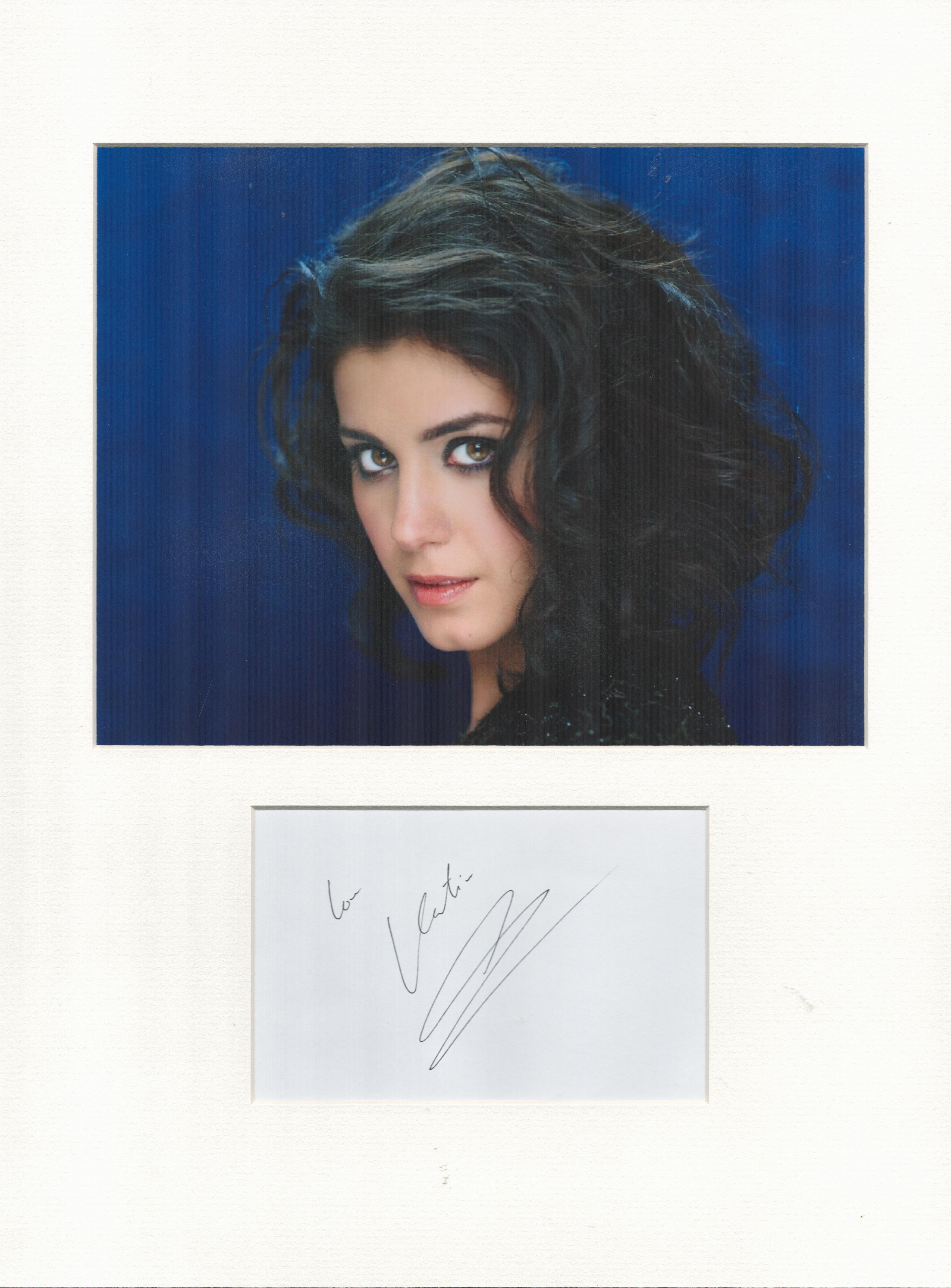 Katie Melua music, signature piece autograph presentation. Mounted with unsigned photo to approx. 16