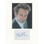 Michael Sheen signature piece autograph presentation. Mounted with unsigned photo to approx. 16 x 12