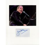 Jools Holland music signature piece autograph presentation. Mounted with unsigned photo to approx.