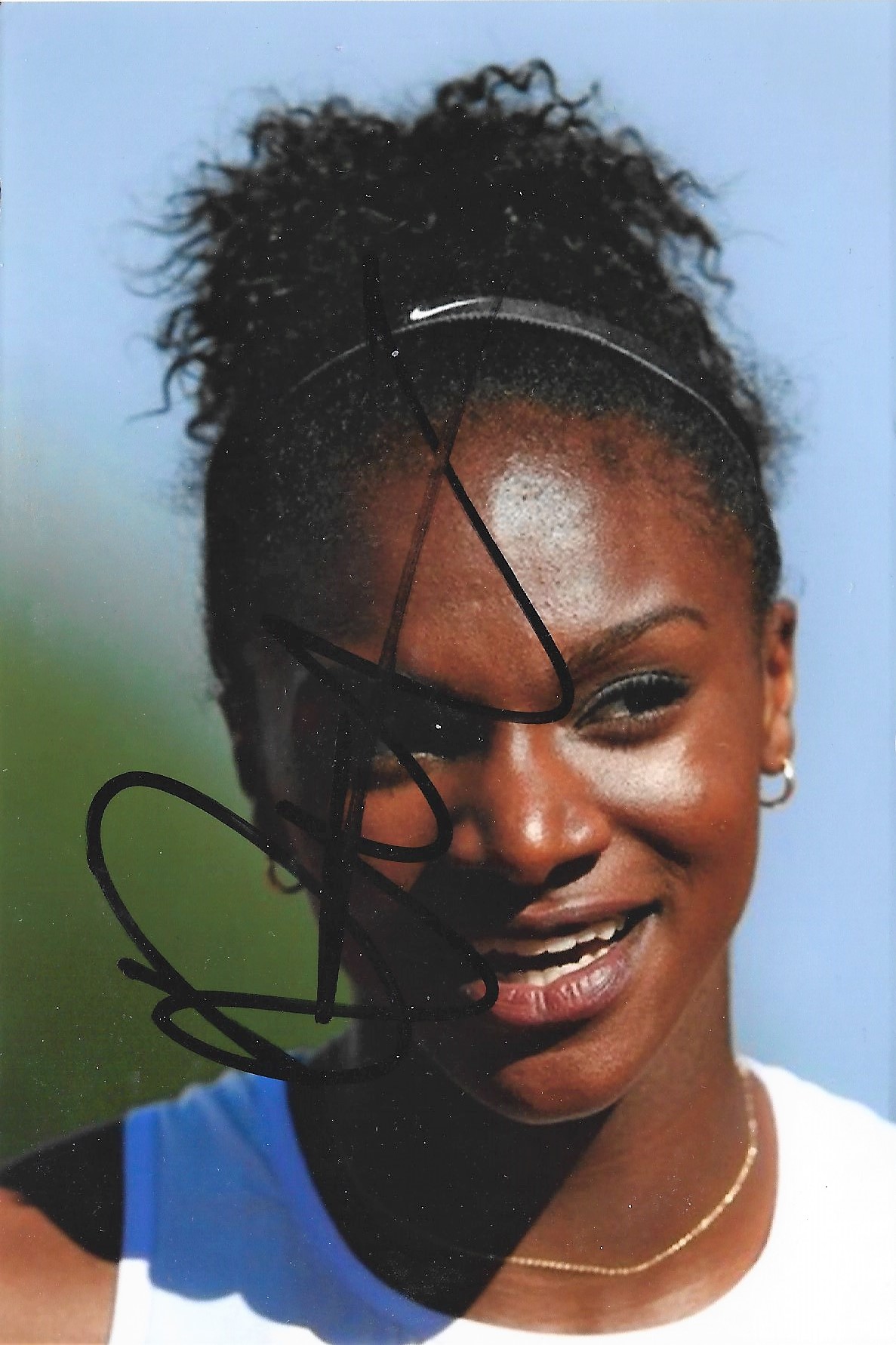 Olympic Dina Asher Smith signed 6x4 colour photo.