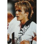 David Beckham signed 6x4 colour England photo. English former professional footballer, the current