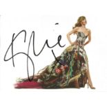 Kylie signed 6x4 colour postcard photo. Good condition. All autographs come with a Certificate of