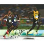 Athletics Usain Bolt signed 10 x 8 inch colour photo in action.