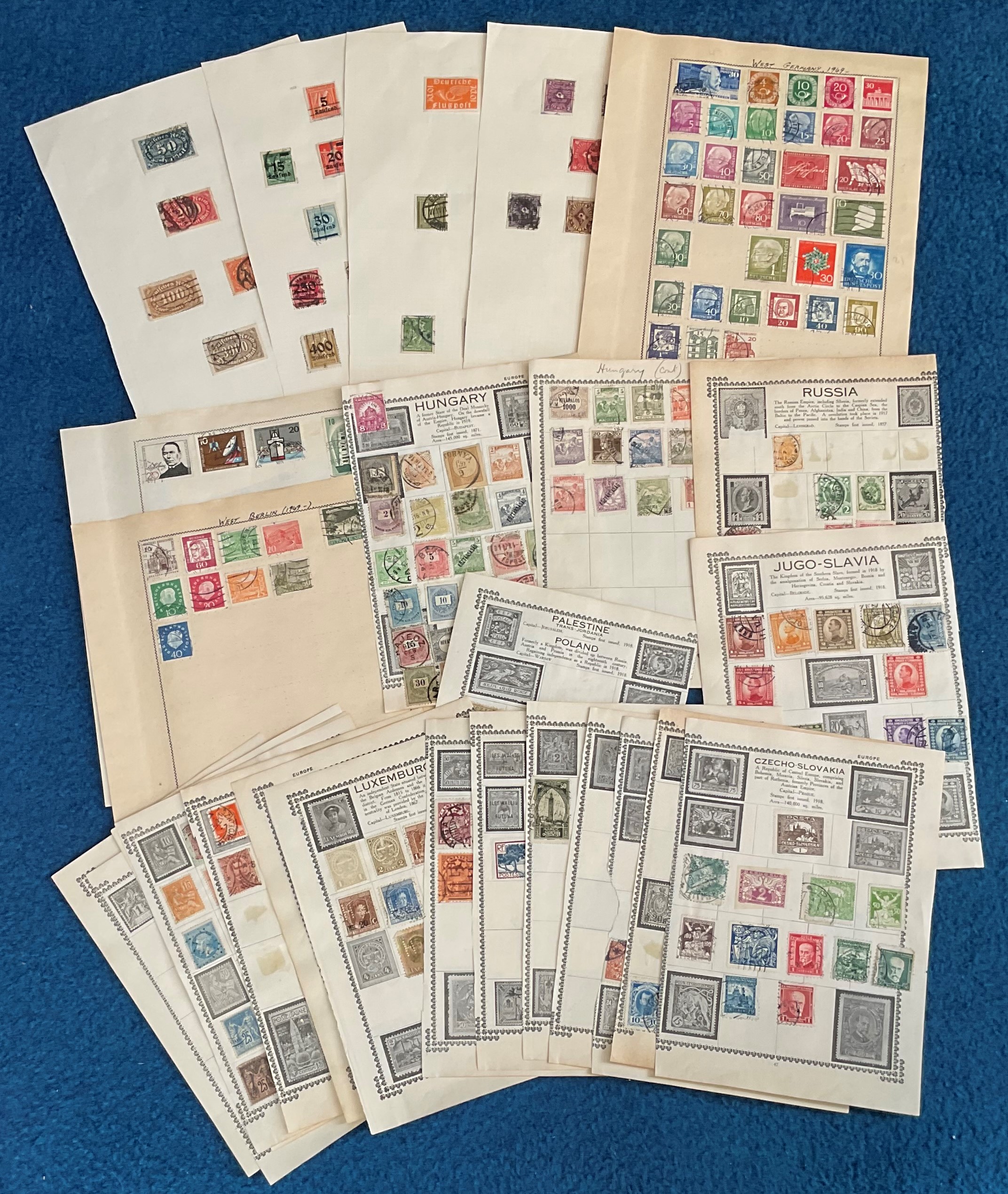 Europe stamp collection on loose album pages. Includes Germany, Yugoslavia, Poland, Russia, Italy
