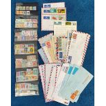 Assorted postal collection. Includes overseas cards and envelopes, covers, Finish stamps, Ghana,