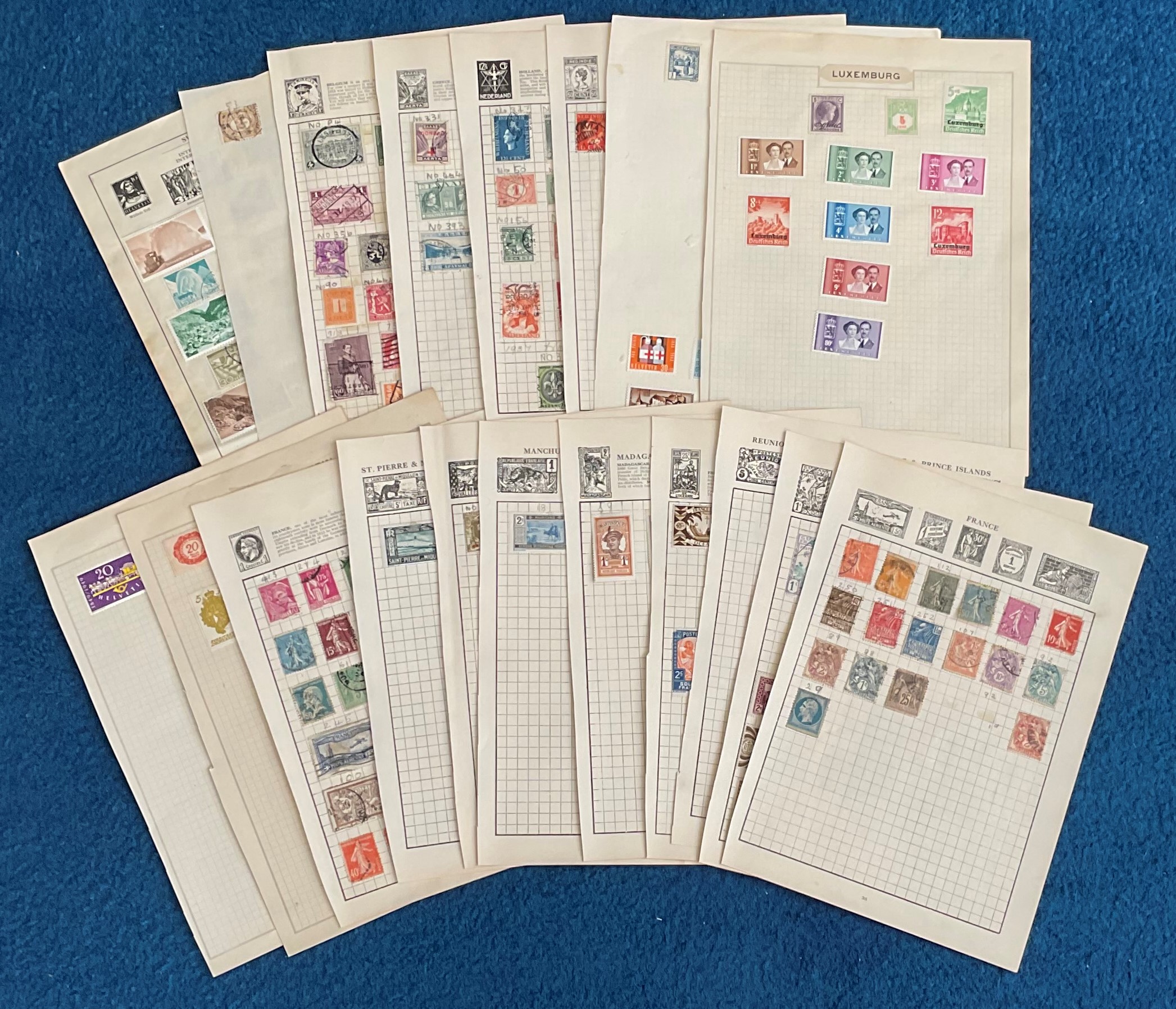 European stamp collection on loose album pages. Includes, Switzerland, Luxembourg, France,